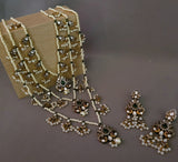 EXCLUSIVE ANTIQUE FINISH KUNDAN LAYERED NECKPIECE WITH EARRINGS