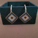 SILVER STUDDED EARRINGS