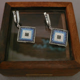 SILVER STUDDED EARRINGS