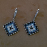 SILVER STUDDED EARRINGS