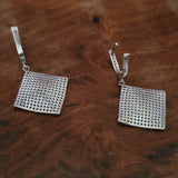 SILVER STUDDED EARRINGS