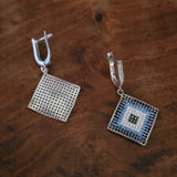 SILVER STUDDED EARRINGS