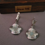 SILVER STUDDED EARRINGS