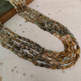 REAL CATS EYE FIVE LAYER STRING