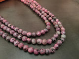 NATURAL PINK MARBLED JADE RONDELLE THREE LAYERS STRING