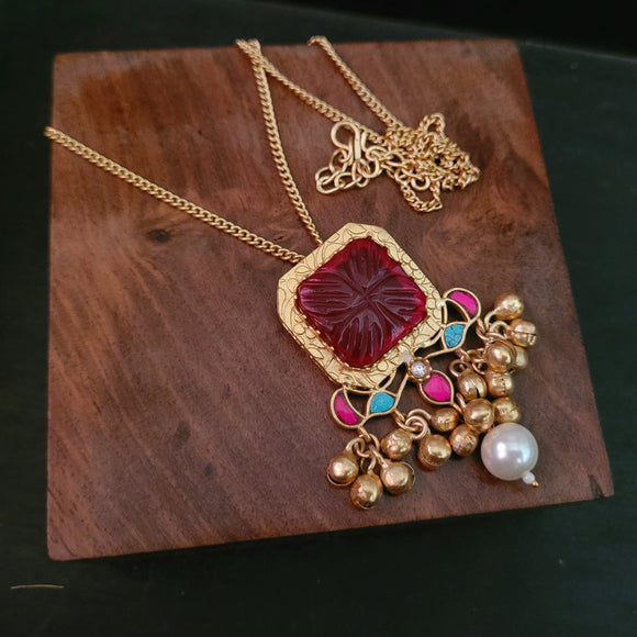 CARVED STONE PENDANT WITH CHAIN