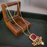 CARVED STONE PENDANT WITH CHAIN