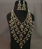 EXCLUSIVE ANTIQUE FINISH KUNDAN LAYERED NECKPIECE WITH EARRINGS