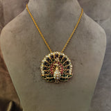 EXCLUSIVE PEACOCK PENDANT AND STUDS SET