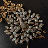 EXCLUSIVE PEACOCK PENDANT AND STUDS SET