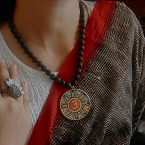 WEAR ME EXCLUSIVE OM PENDANT WITH LAVA STRING