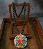 WEAR ME EXCLUSIVE OM PENDANT WITH LAVA STRING